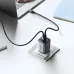 Lifestyle view of UGREEN CD294 Nexode 45W dual USB Type-C GaN fast charger powering a device on a desk.