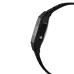 Angled side view of Casio F-91W-1DG Watch with black strap and single metallic button for mode control.