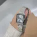 Close-up of Casio LTP-V007D-7EUDF Ladies Chain Watch held in hand with silver dial and minimalist markers.