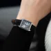 Close-up of Casio LTP-V007L-7B1UDF Ladies Watch with silver dial and black strap worn on wrist with dark outfit.