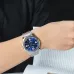 On-wrist viewpoint of the Casio MTP-1314D-2AVDF Analog Watch positioned over an open book page.
