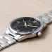 Front view of Casio MTP-V005D-1B5UDF Analog Watch with silver band and black dial featuring bold white numerals.
