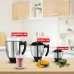 Display of Tefal Grindmax HD Mixer Grinder jars labeled liquidizer, grinder, and chutney with food items beside them.