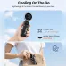 Lifestyle cooling view of Unikyy Blade Pro Handheld Portable Turbo Fan in use outdoors showing strong airflow and compact grip