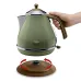 Delonghi KBOV2001.GR 1.7L Icona Vintage Electric Kettle lifted from base showing 360 degree rotation feature