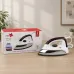 Lifestyle view of Pigeon PG-191 dry iron displayed beside retail packaging on a tabletop surface.