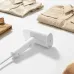 Xiaomi Handheld Garment Steamer keept beside cloth