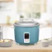 Lifestyle view of Panasonic SR-Y18G Rice Cooker on kitchen counter with bowls of rice and soup beside it.