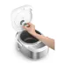 Close‑up view of the Philips HD3170/62 Mini Rice Cooker showing a hand placing the inner pot inside the cooker.
