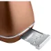 Delonghi Distinta CTI2103.CP 900W Metallic Toaster bottom view copper body with removable silver crumb tray