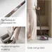 Usage view of the Dyson PencilVac Fluffycones Vacuum Cleaner cleaning tight spaces, edges, and under furniture with slim design.