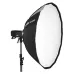 Front-angled view of the black and white Godox AD-S85S parabolic softbox on a light stand.