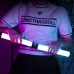 Ulanzi VL110 RGB tube light attached magnetically to clothing emitting colorful ambient glow