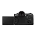 Rear view of the black Canon EOS R5 C mirrorless camera with the articulated screen flipped out.