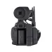 Side view of the black JVC GY-HC550E camcorder showing the battery bay, viewfinder, and ports.