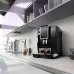 De'Longhi Dinamica ECAM350.15.B coffee machine in a modern kitchen setting.