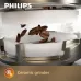 Close-up of Philips EP4346/70 4300 Series Coffee Machine ceramic grinder with beans falling between durable grinding discs.