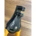Close-up of Tolsen 38049 Automatic Wire Stripper on wooden surface showing serrated jaws and wire gauge markings.