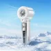 Lifestyle view of Hoco HX613 portable handheld fan with humidifier standing on a snowy surface.