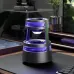 Xiaomi Qualitell X2 Electric Mosquito Killer Lamp with purple UV light glowing on a desk