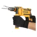 Action view of INGCO ID9008 Drill Machine held with both hands and gloves while drilling with attached bit.