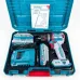 Tool kit view of TOTAL TIDLI20602 Drill Machine with dual batteries, charger, and manual inside teal case.