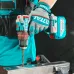 Workshop action of TOTAL TIDLI426981 Drill Machine drilling into metal with gloved hands and clamped workpiece.