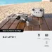 Outdoor view of DJI Lito 1 Drone on wooden surface beside RC-N3 controller near beach background.