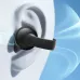 Ear view of Anker Soundcore C50i earbud with blue wave graphics illustrating ergonomic fit and noise cancellation.