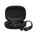 JBL Endurance Peak 4 black waterproof sports earbud resting outside open charging case