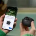 Top view of OnePlus Nord Buds 4 pairing screen on smartphone with earbuds case held in hand.