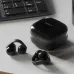 Sony LinkBuds Clip WF-LC900 Earbuds, lifestyle view with black earbuds and charging case placed beside a laptop keyboard