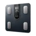 Eufy smart scale angled front view with glass surface, metal sensors, and digital display showing weight and body metrics