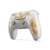 Front view of PS5 DualSense Ghost of Yotei controller with gold brush art, buttons, and dual analog sticks visible.