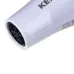 Close-up of Kemey KM-5813 Hair Dryer nozzle showing black protective grille and printed model details.