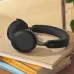 Lifestyle view of Jabra Evolve3 75 MS LINK390C Wireless Headphone placed on books with clean setup