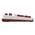 Side profile view of 8BitDo Retro 108 Keyboard with two-tone maroon and white casing and angled ergonomic keycaps.