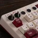 Control panel view of 8BitDo Retro 108 Keyboard featuring rotary knobs, bilingual key labels, and red ESC lock key.