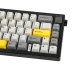 Close-up of the AJAZZ AK650 keyboard's keys, featuring grey, white, and yellow keycaps and a large black knob.