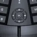 Close-up view of the Meetion DirectorC Wireless Keyboard Mouse Combo keyboard showing circular multimedia control pad and key layout.