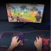 Gaming desk setup view of the Meetion MT‑KB015 Left Handed Gaming Keyboard showing one‑hand RGB keypad in use with mouse and monitor gameplay scene