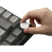 Hand adjusting rotary knob on T-Wolf ZK82 Mechanical Keyboard with labeled function and navigation keys.