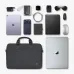 Flat lay of BWOO BO-CB46 15.6 Inch Laptop Backpack with organized tech items including laptop, tablet, cables, and daily essentials