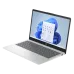 An angled view of the open silver HP 14-ep0134TU laptop, displaying the Windows 11 desktop on the screen.
