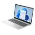 A light silver HP 15-fd0275TU laptop shown open at an angle, displaying the Windows 11 desktop on a bright screen.