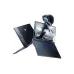 Advanced gaming laptop with RGB keyboard and futuristic robot display, showcasing high-performance and stylish design