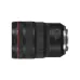 Side profile of Canon RF 24-70mm f/2.8 L IS USM lens lying horizontally displaying AF/MF and Stabilizer switches