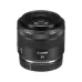 Angled view of Canon RF 35mm f/1.8 Macro IS STM lens displaying Canon logo, focal ring, and control switch