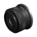 Front angled view of Canon RF-S 10-18mm F4.5-6.3 IS STM Lens showing textured zoom ring and wide-angle design.