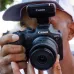 Photography view of Canon RF-S 10-18mm F4.5-6.3 IS STM Lens attached to Canon EOS R7 camera in use.